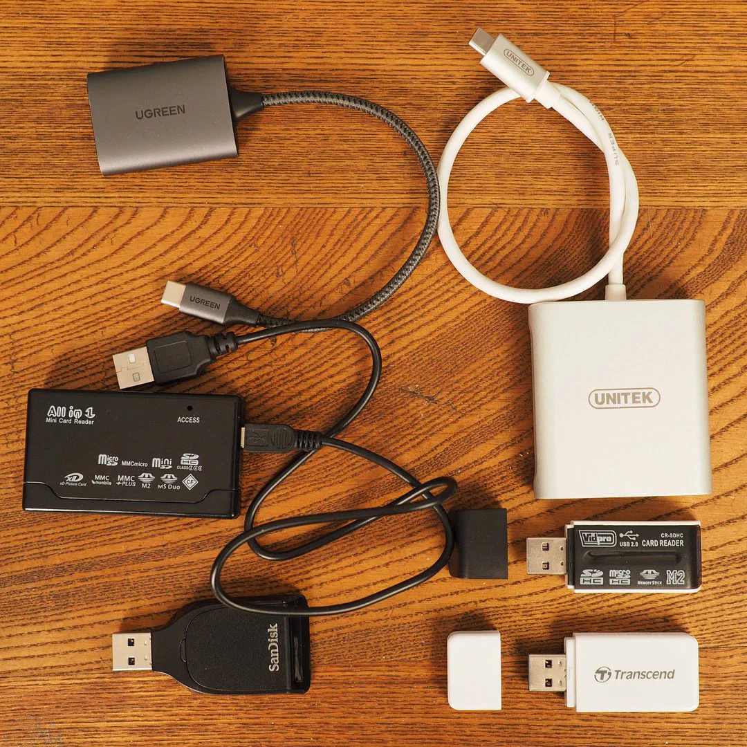 A variety of different SD memory card readers. A variety of different SD memory card readers.